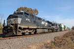 NS 9751 and 1819 take train 21Q onto the siding